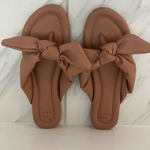 A NEW DAY Bow sandals in brown. WORN ONCE